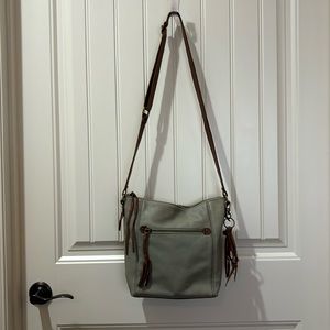 The Sak handbag with adjustable strap in like new condition